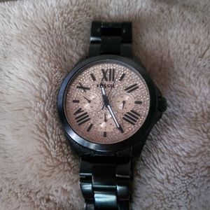 Rose gold and black Fossil watch